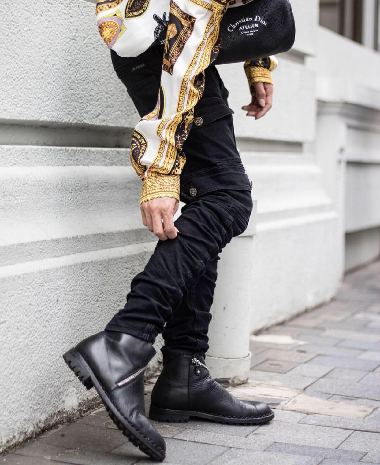 black stacked jeans with dior bag