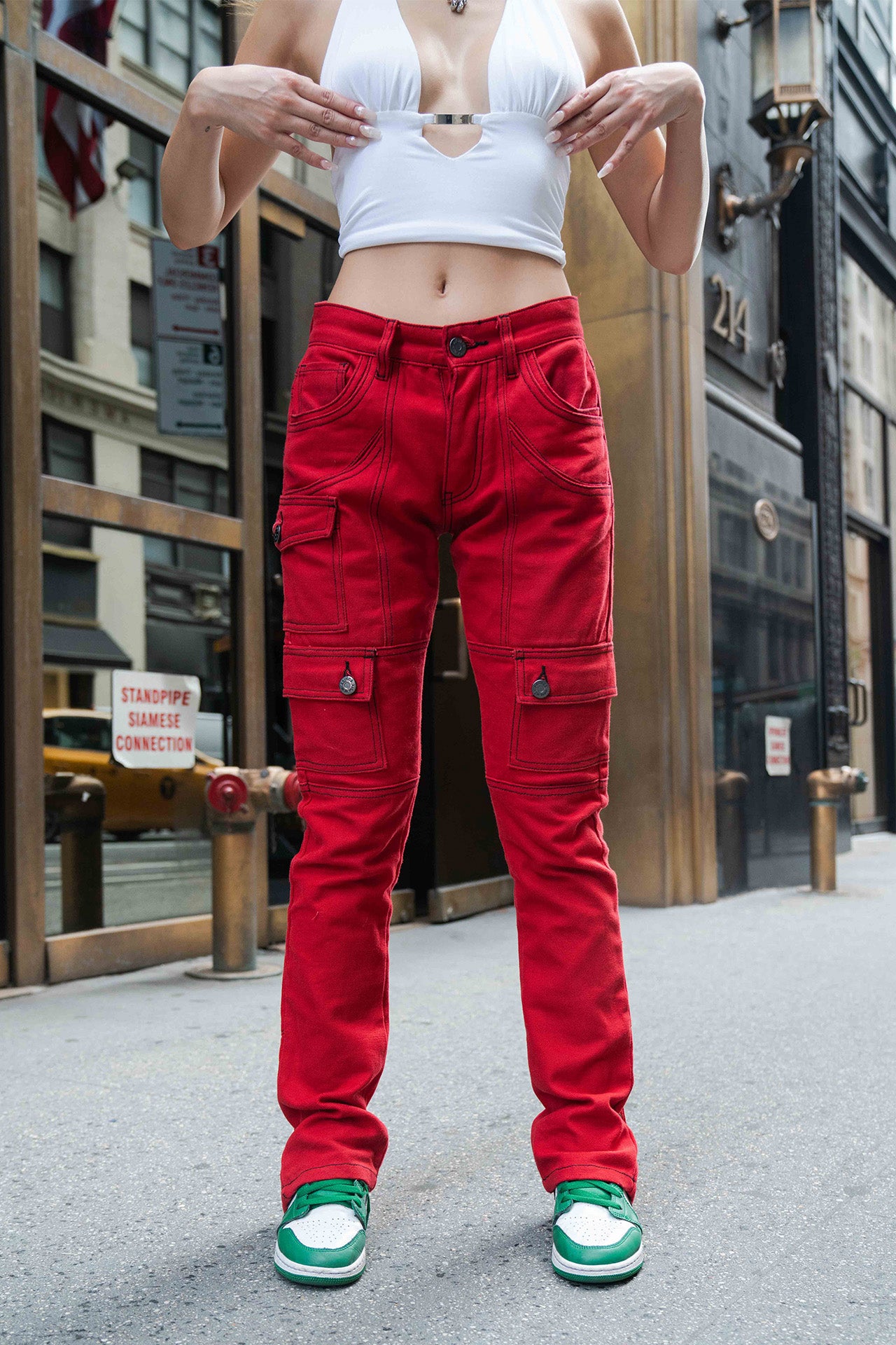 FEMALE MODEL WEARING A SIZE 32 OF RED KYLE SNAP CARGO PANTS