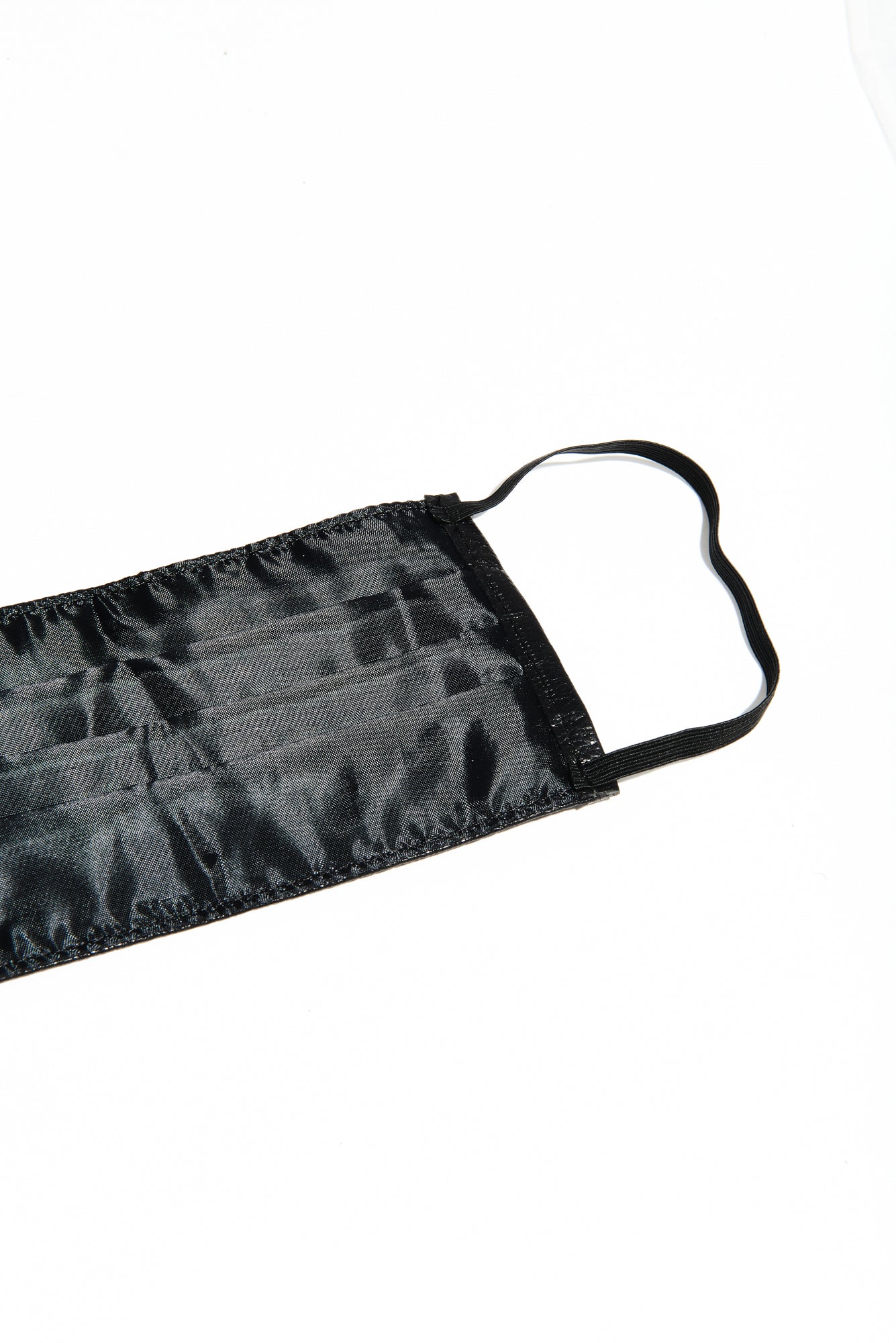 Close-up showing mask seam and strap on Onyx Face Mask