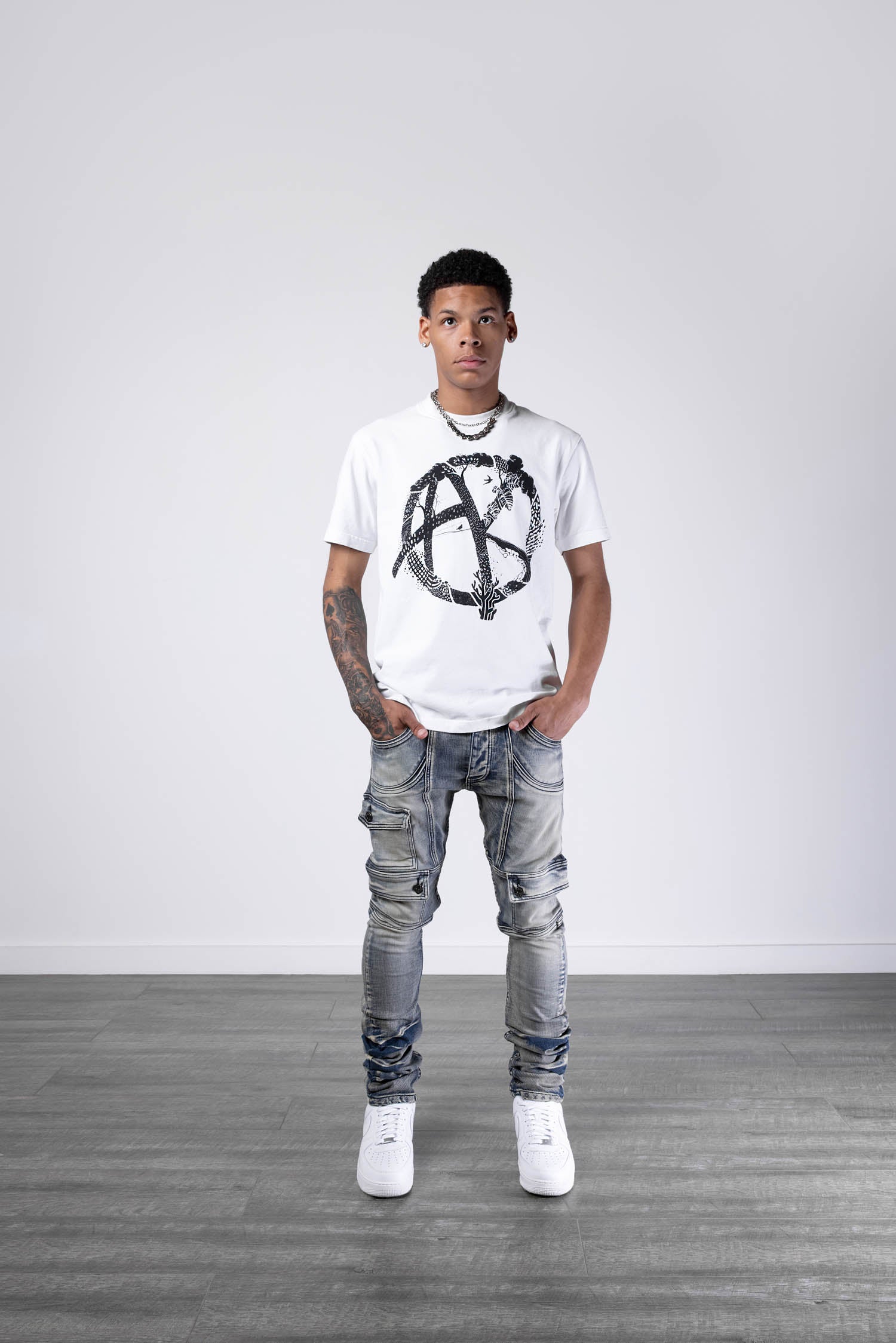 model wearing color white and size large of AKINGS Tree of Life T-Shirt,