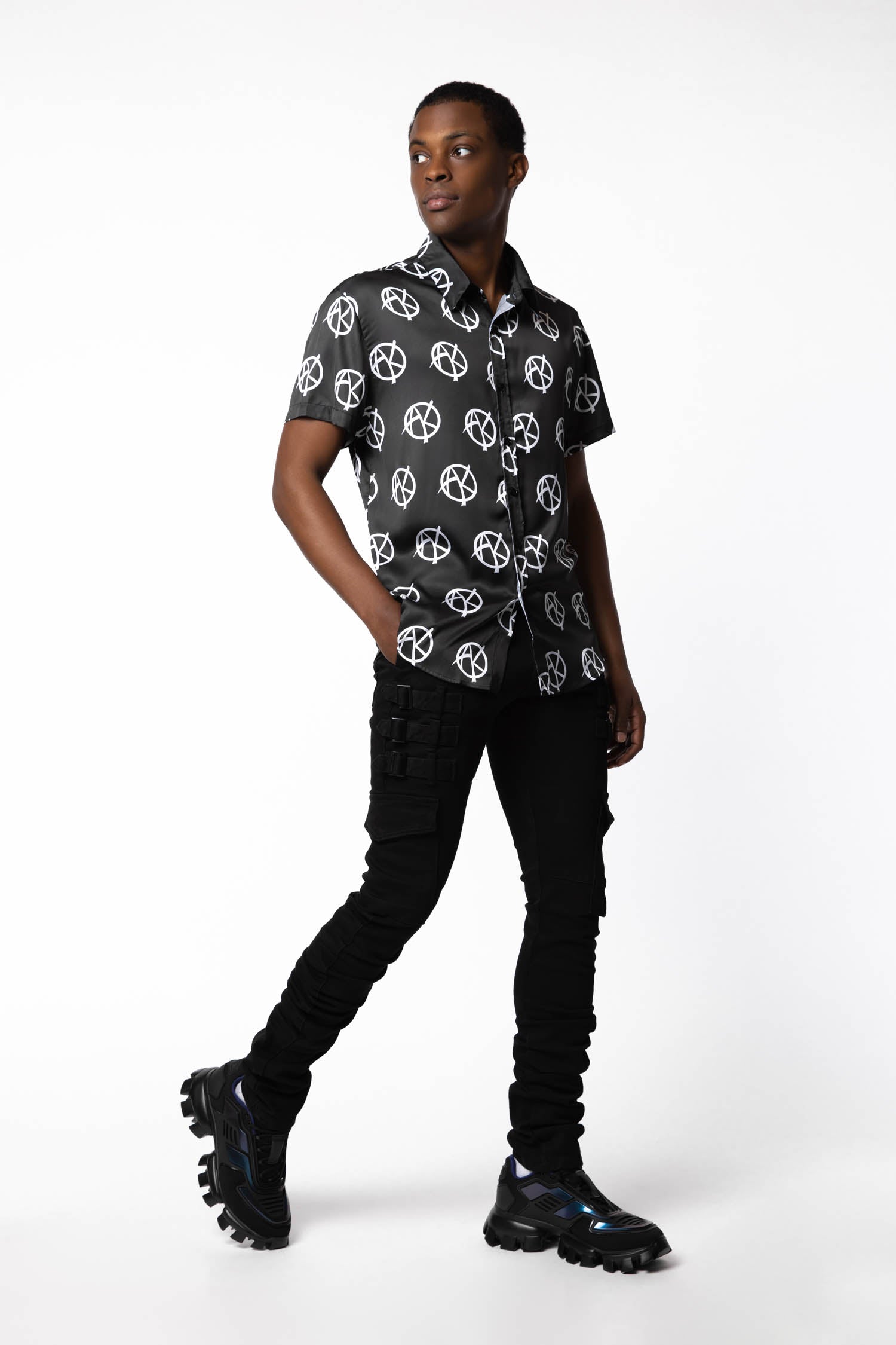 model wearing size Large of Anarchy Satin Shirt in black