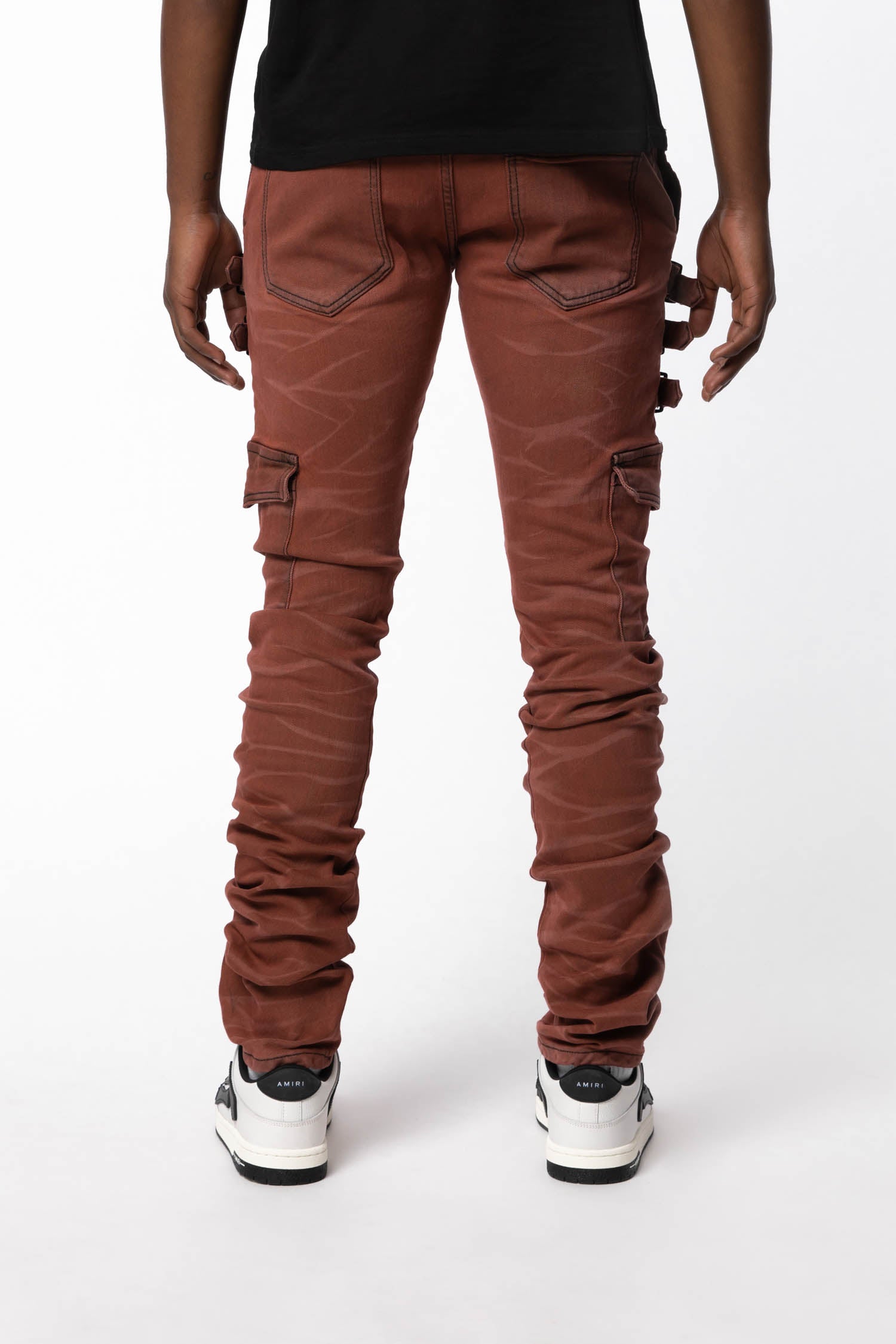 Rear view of Omari Crimson jeans showing pocket design and red color