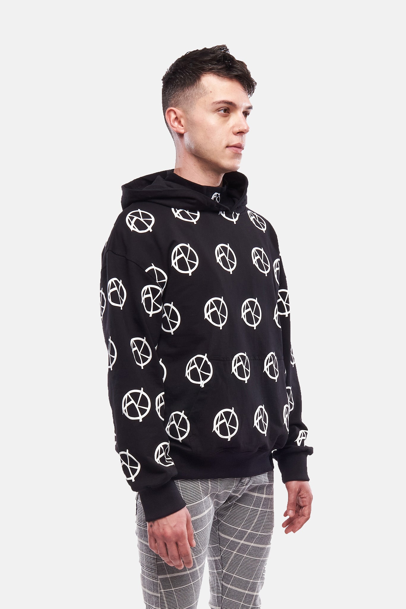 Detail of multi-logo print on sleeve of Anarchy Hoodie