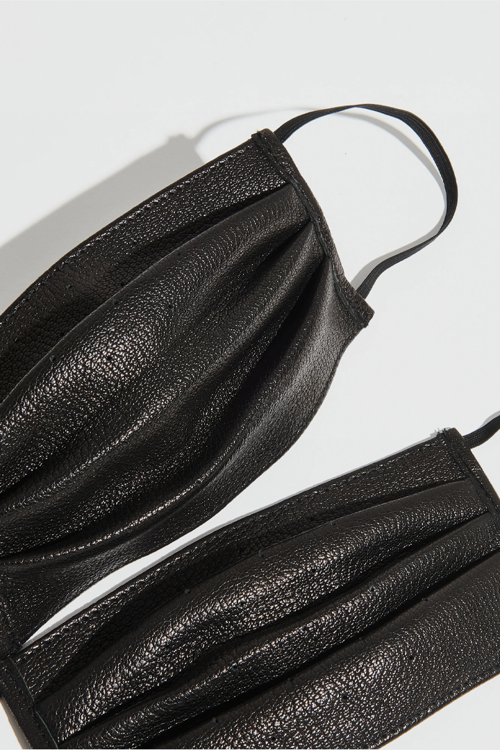 lose-up of print texture and elastic straps on Cow Hide Face Mask