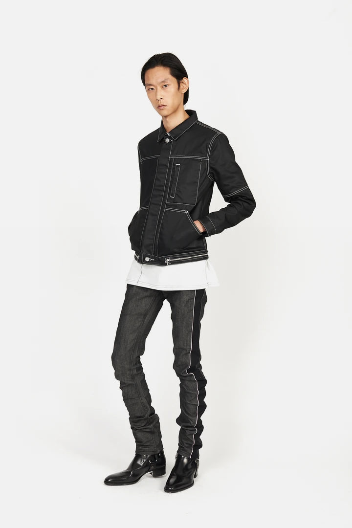 Side view showing waxed texture and pocket flap detail