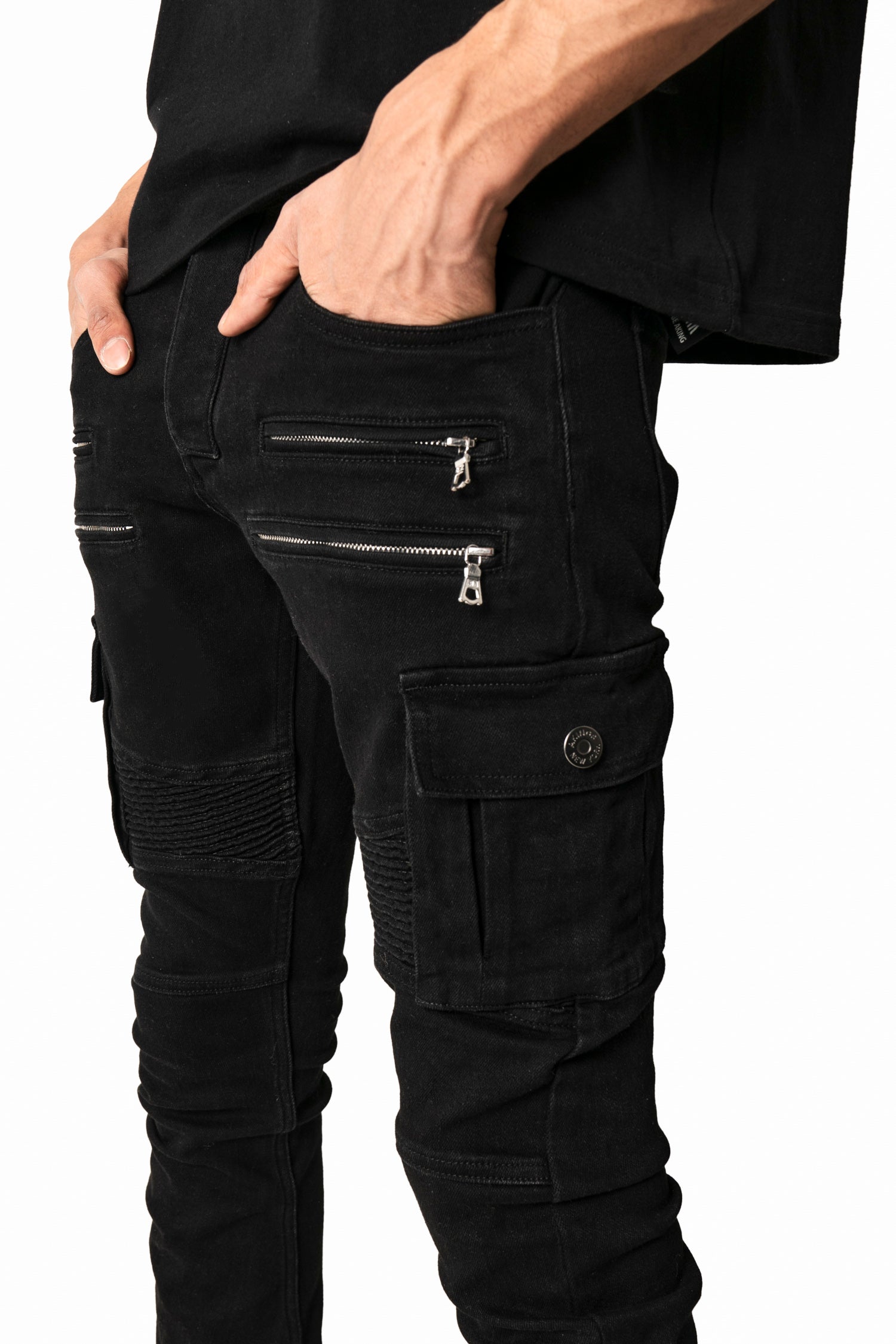 close up view of silver hardware of pockets and zipper