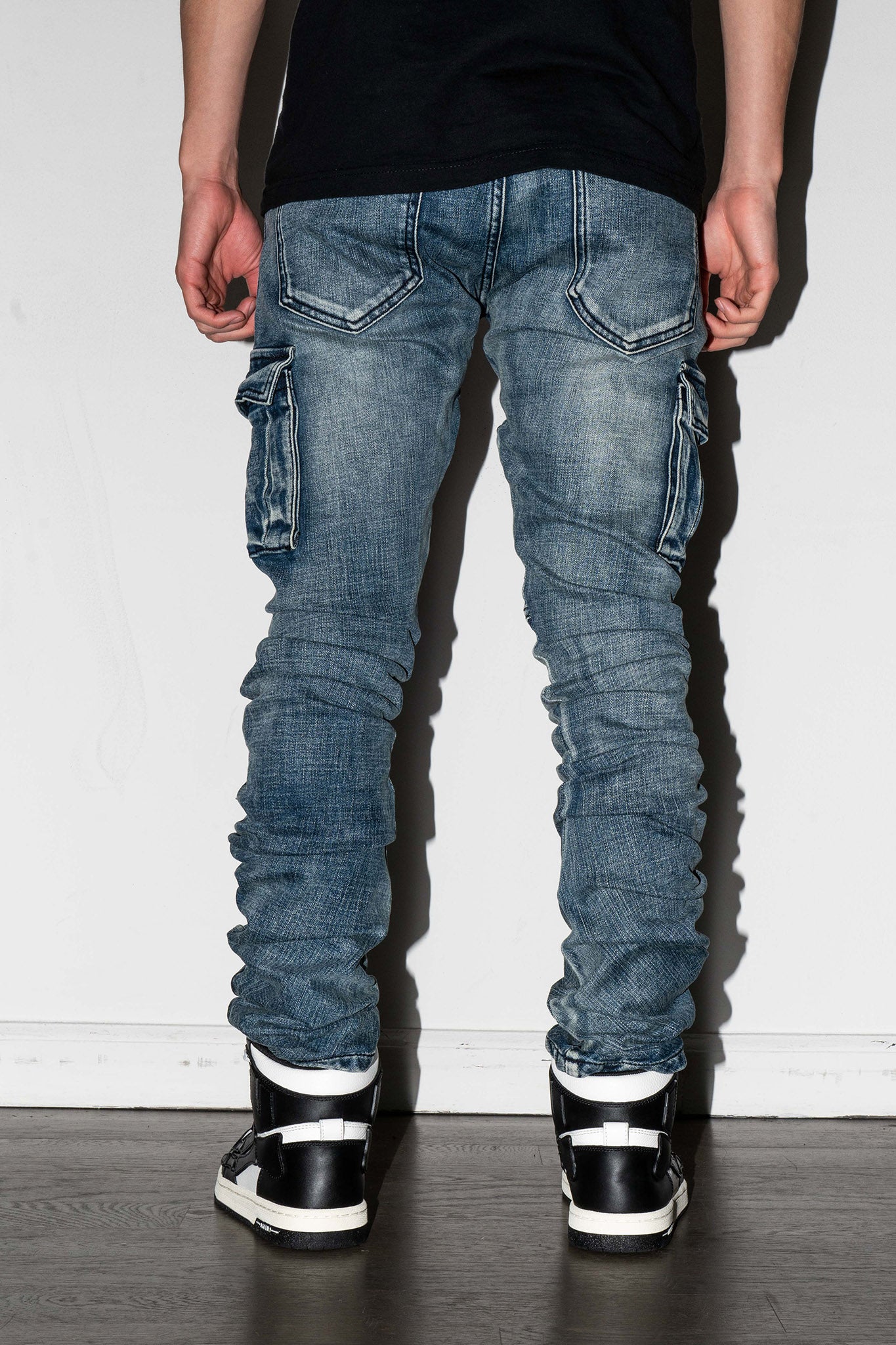 back view of AKINGS Biker Stacked Jeans