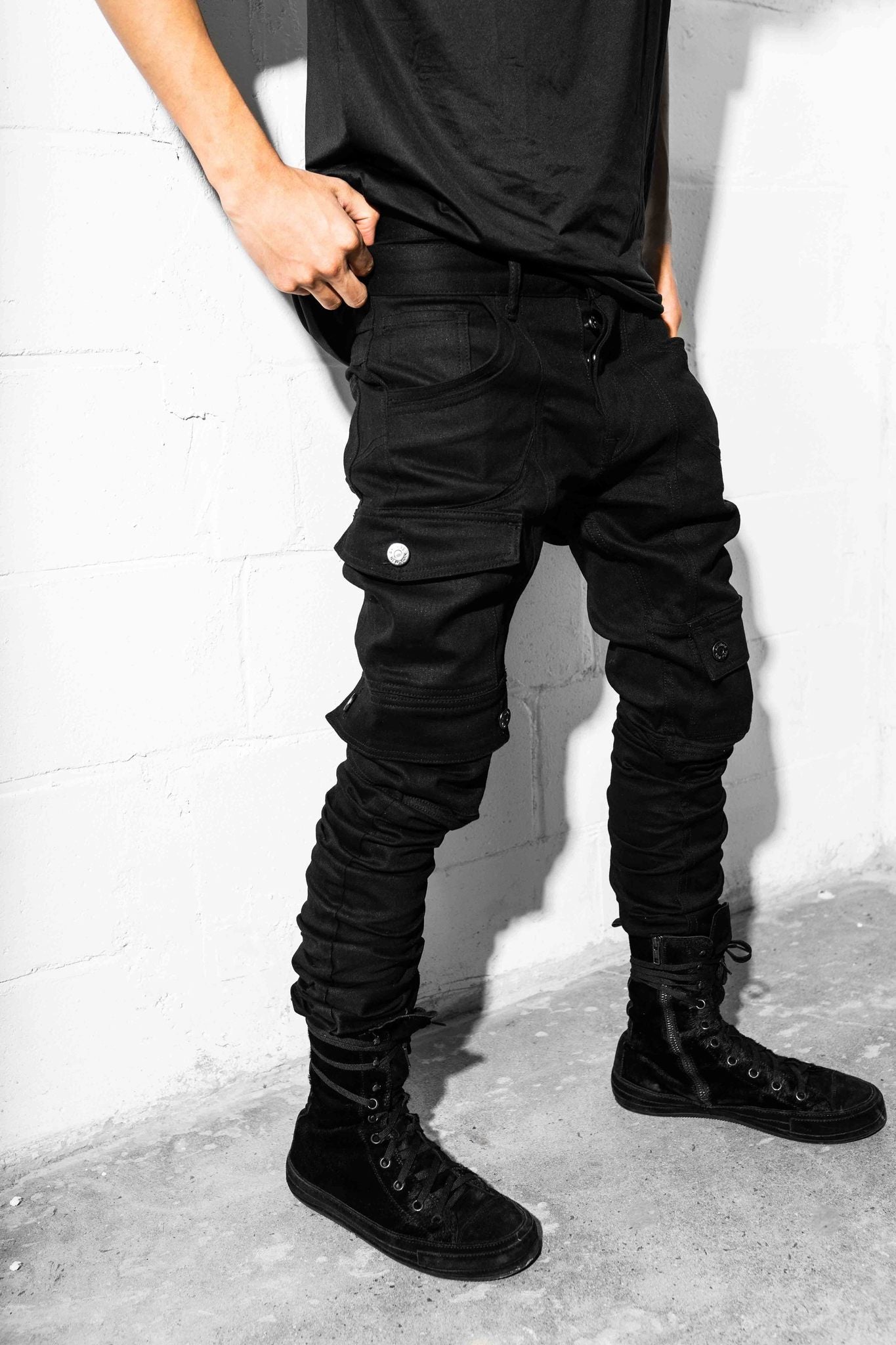Side view of AKINGS Kyle Jeans, stacked fold