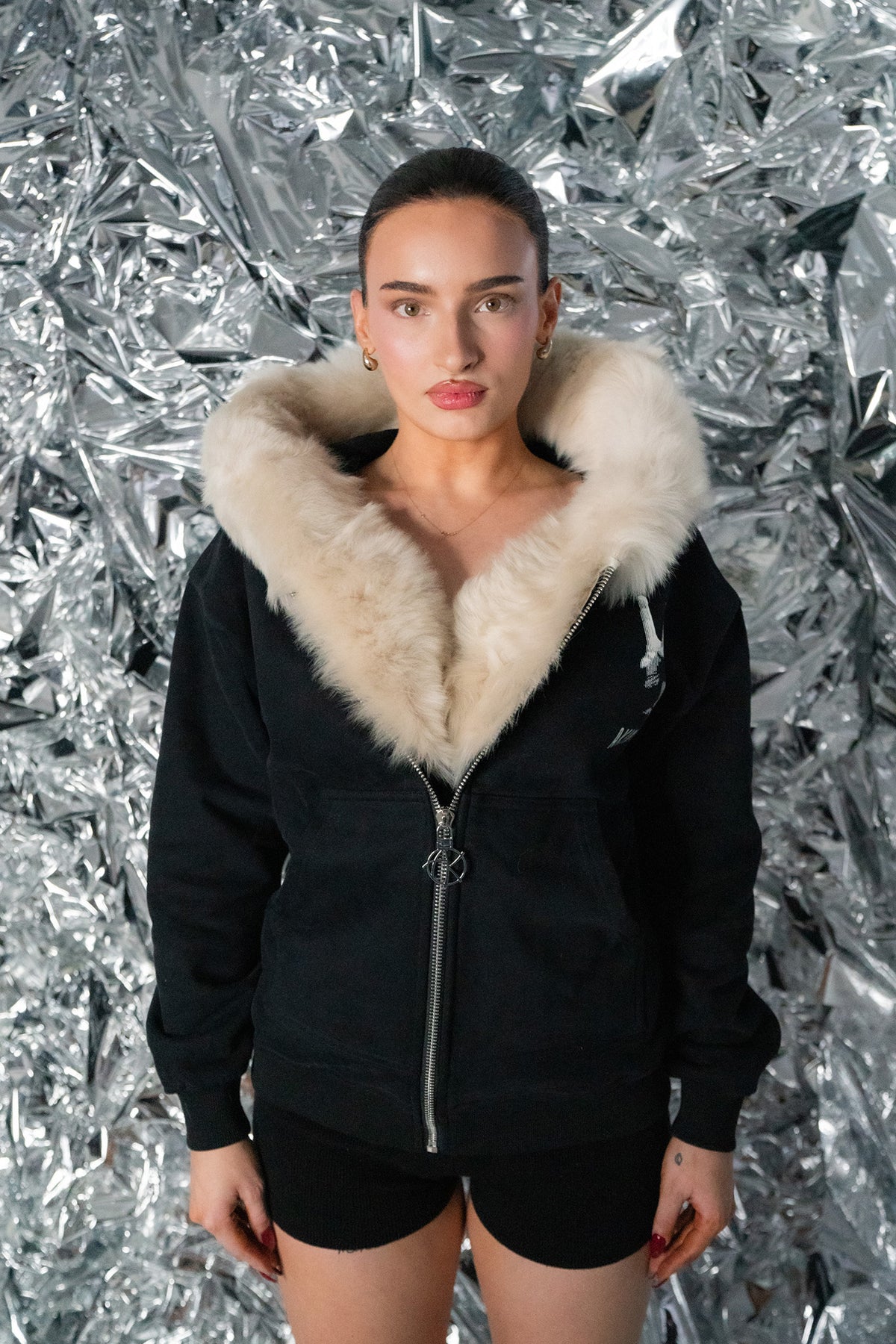 model not wearing the hoodie of GENUINE MERINO FUR PEACE ZIP HOODIE