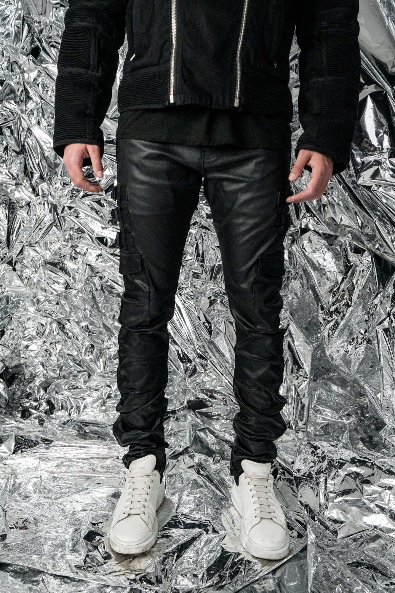 Front view of AKINGS Omari Waxed Jeans, black coated wax finish