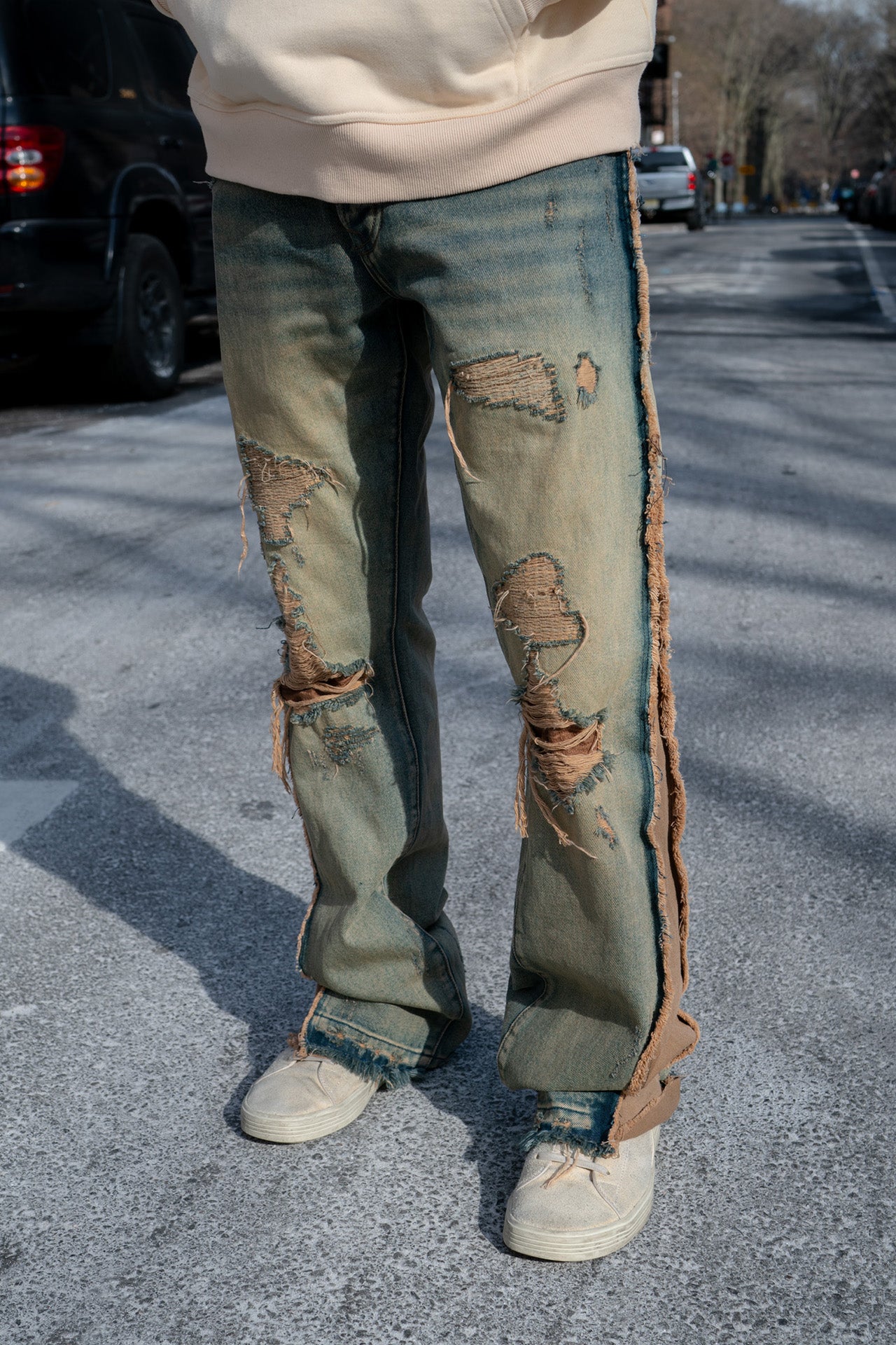 DISTRESSED SANDBLASTED JEANS