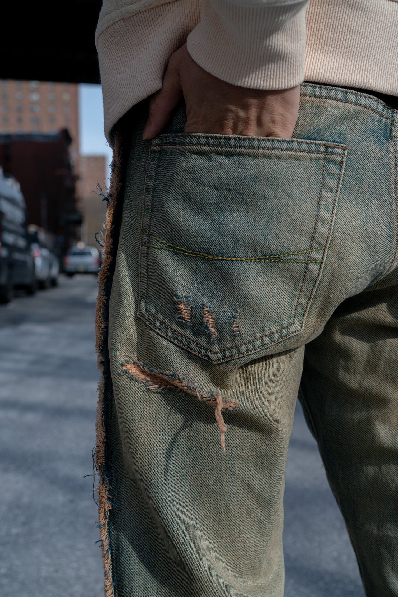 DISTRESSED SANDBLASTED JEANS