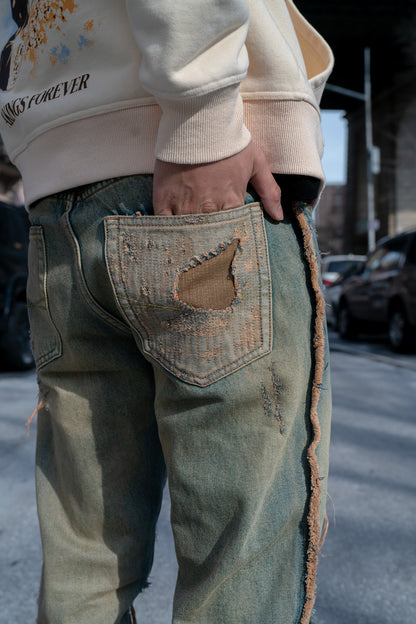 close-up view of pocket, with distressed design