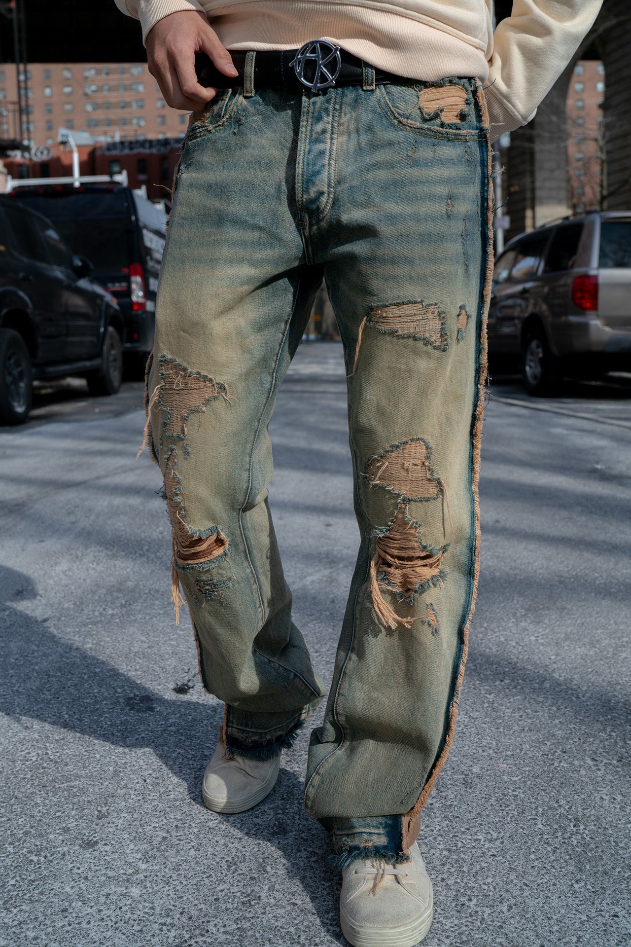 DISTRESSED SANDBLASTED JEANS