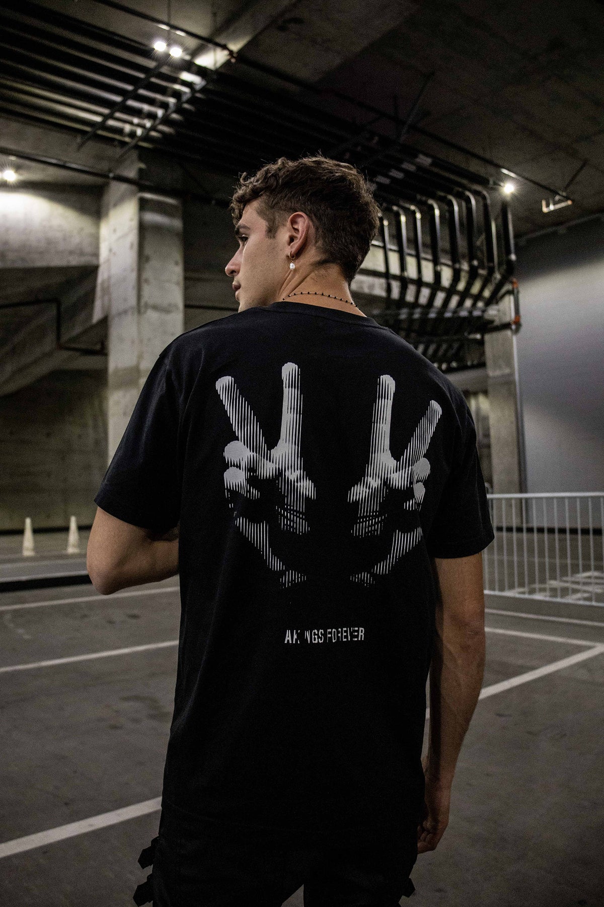 Back view of Peace T-shirt showing full back print of ‘Peace’ design