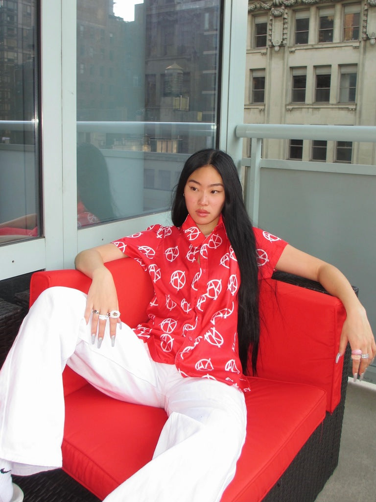 Model wearing size small of Red ANARCHY SATIN SHIRT