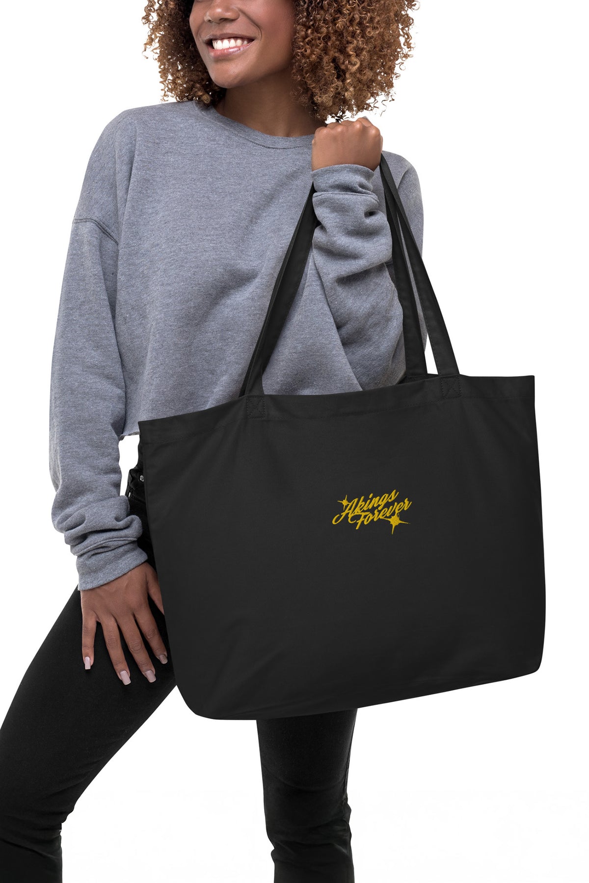 Model wearing AKINGS FOREVER LARGE ORGANIC TOTE BAG 