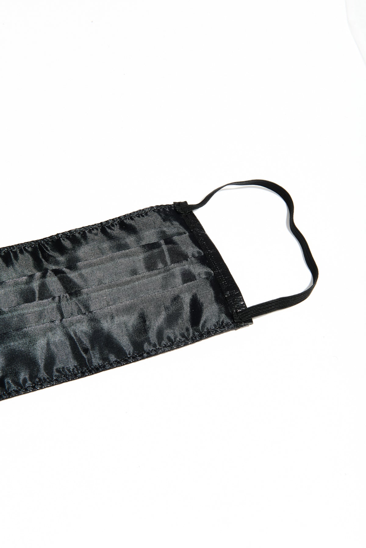 Close-up showing mask seam and strap on Onyx Face Mask
