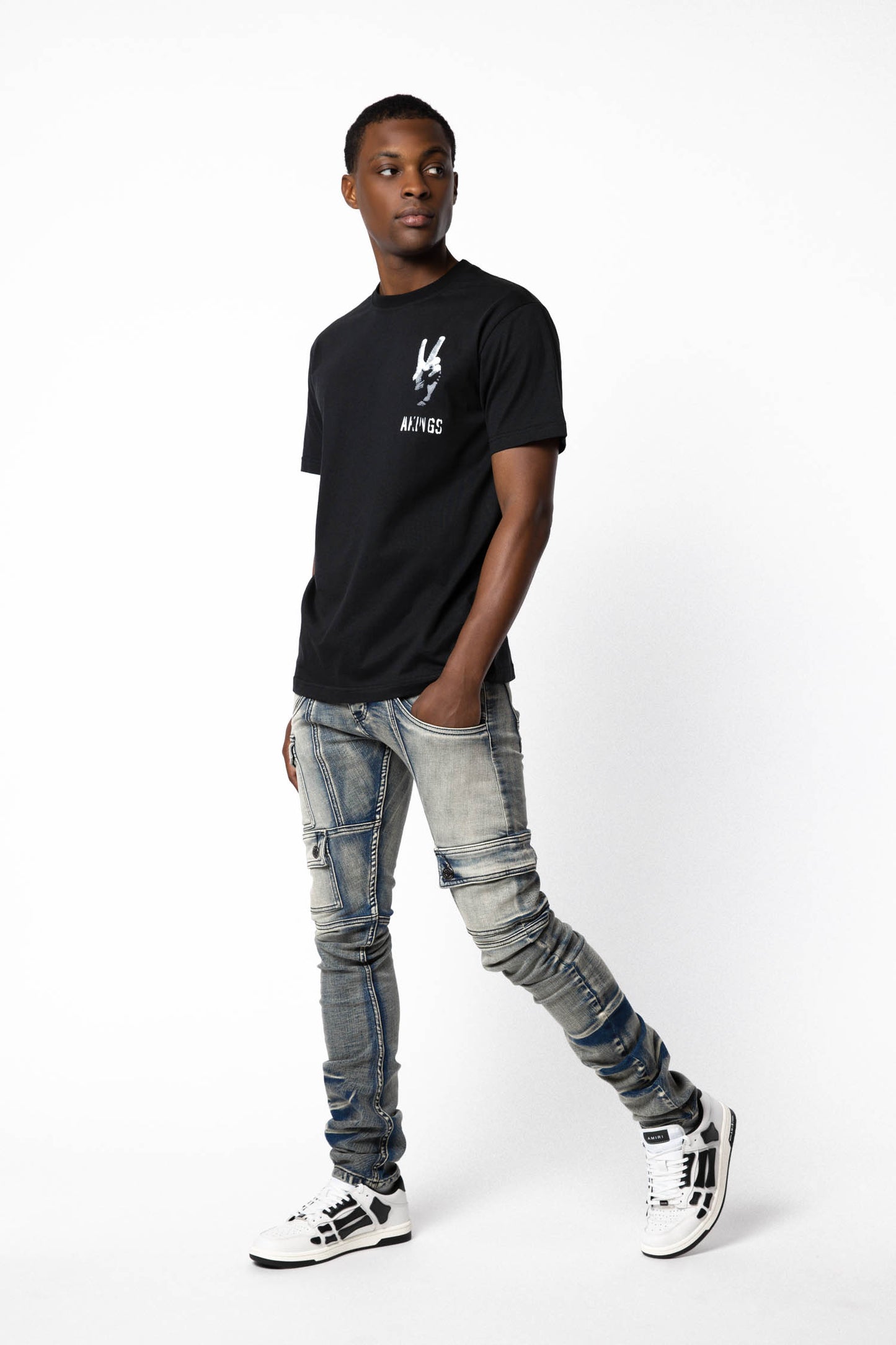 model showing the side inseam detail of Peace T-shirt 