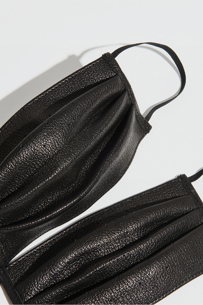 lose-up of print texture and elastic straps on Cow Hide Face Mask