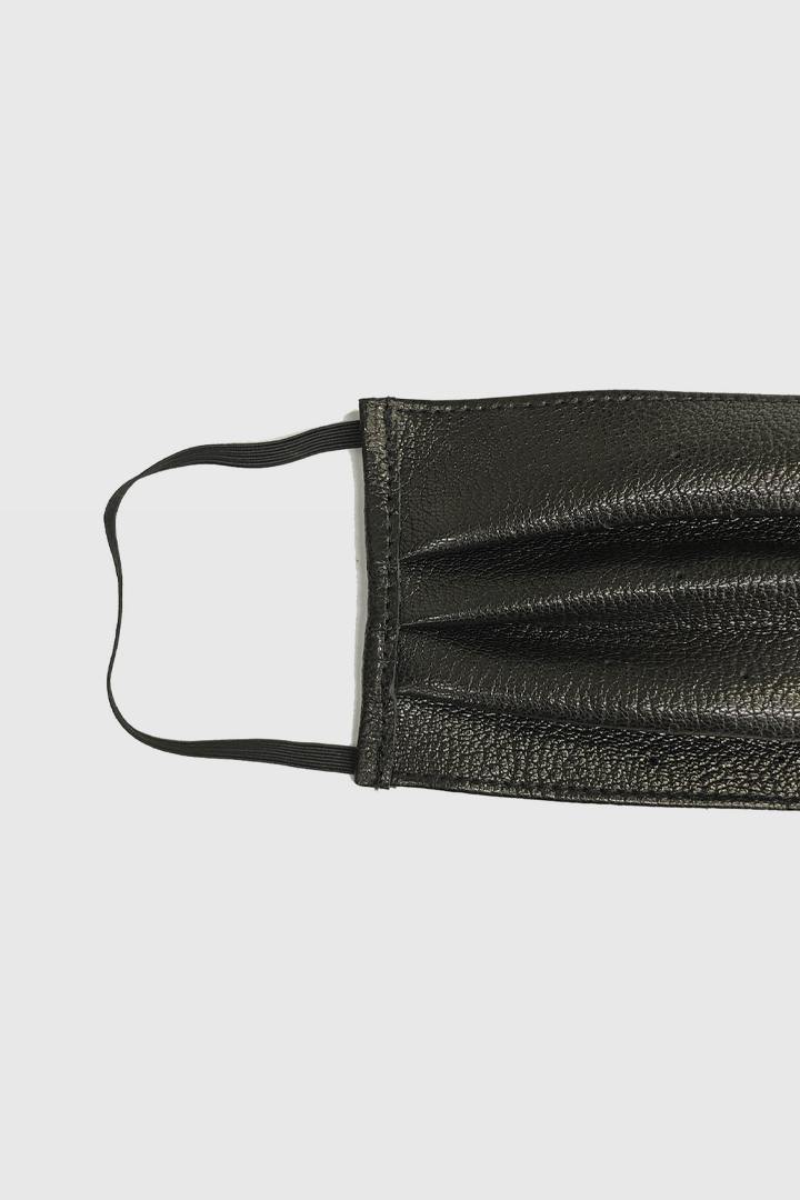 Front view of AKINGS Cow Hide Face Mask, cow print pattern