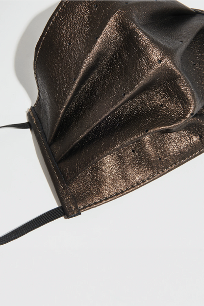 Close-up showing the Dust Gold ON Face Mask