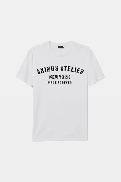 flat lay of AKINGS Atelier T-shirt in white