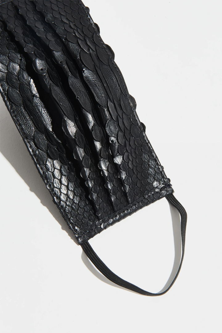 flat lay of vegan python face mask