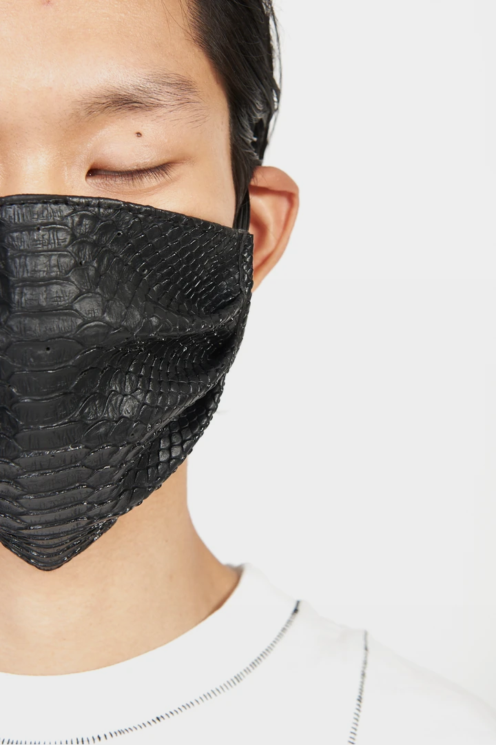 Close-up of scale-like python texture on Vegan Python Face Mask