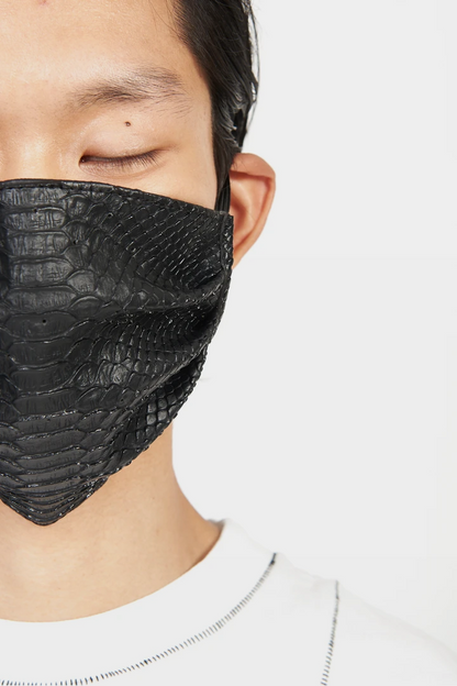 Close-up of scale-like python texture on Vegan Python Face Mask