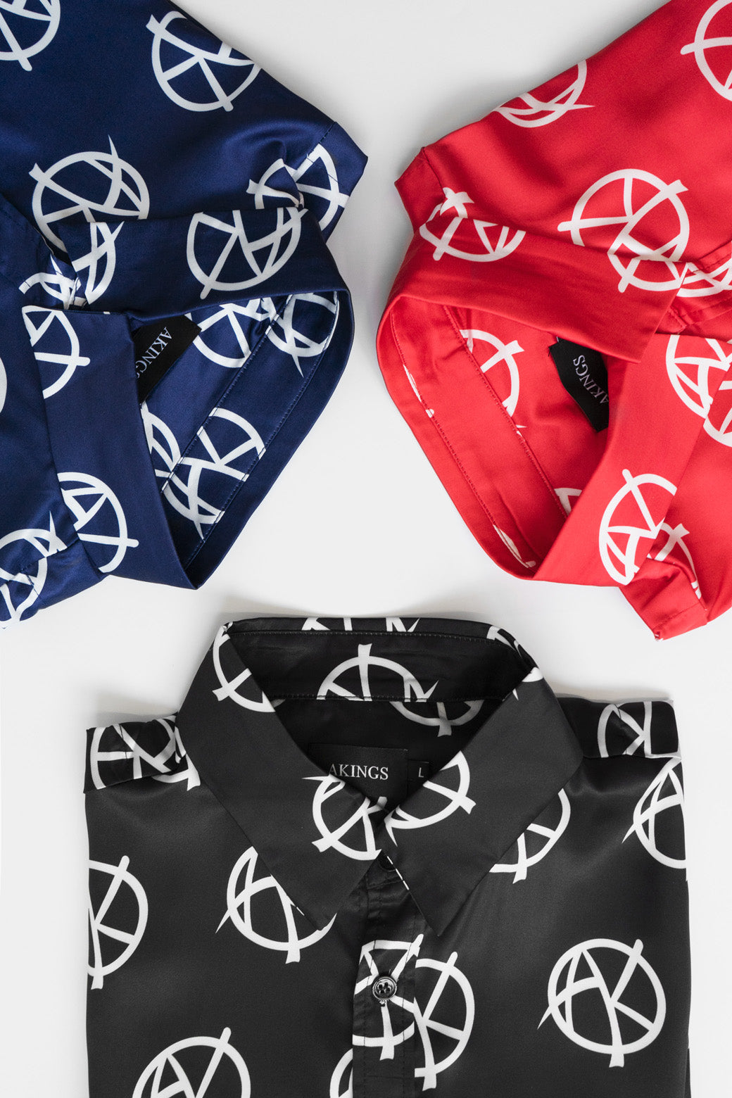 Flat lay of blue, black and red ANARCHY SATIN SHIRT 