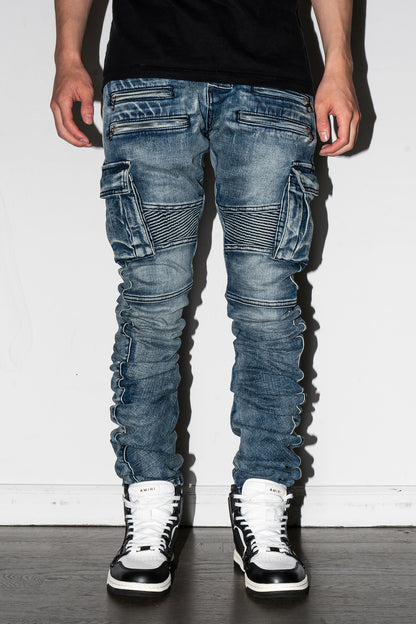 Detail of knee seam on Biker Stacked Jeans in blue