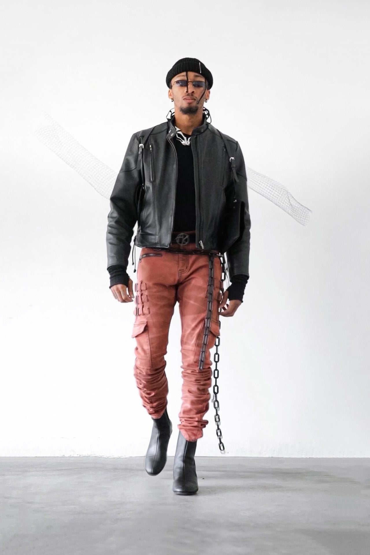 model in omari crimson jeans