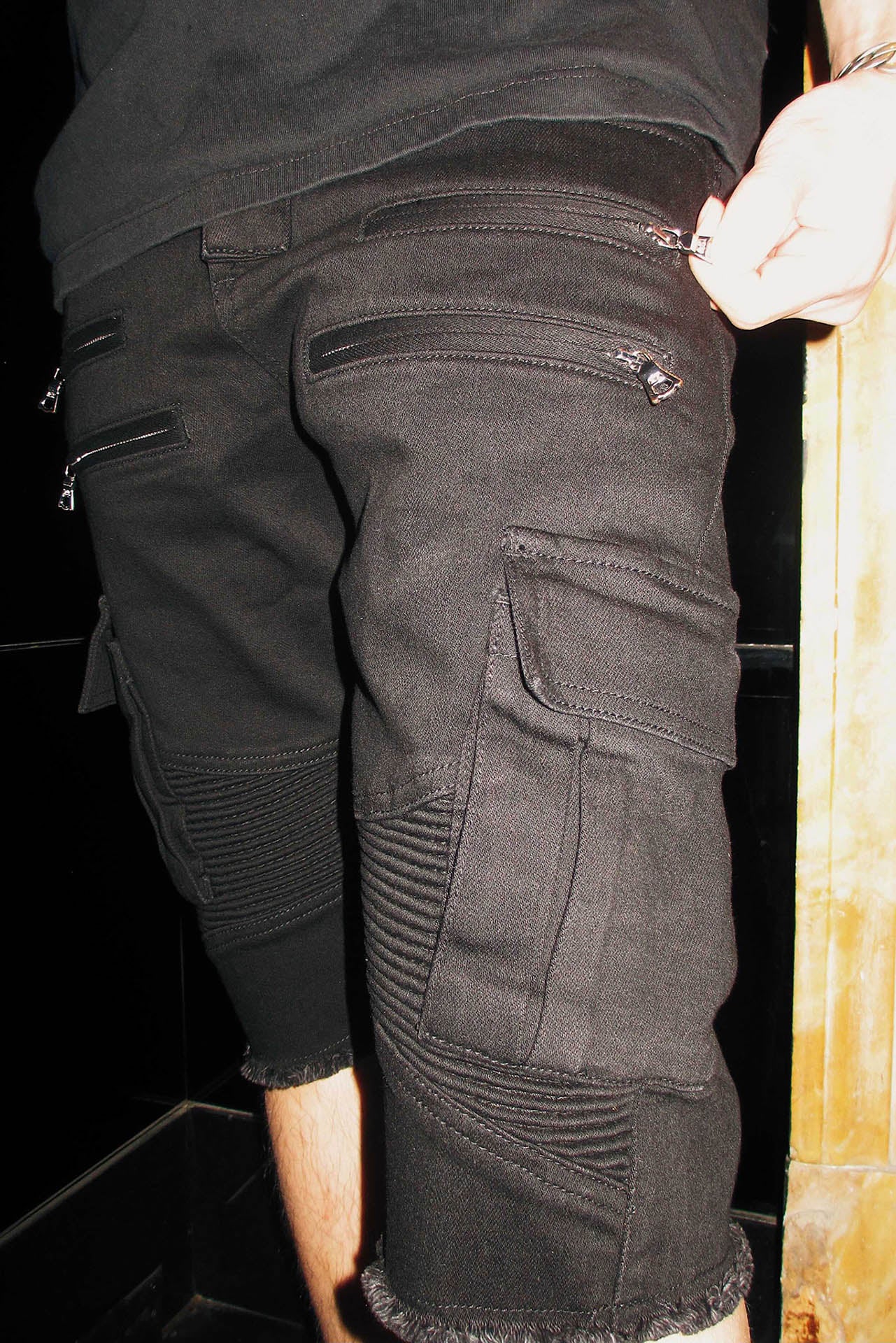 Close up shot, showing pocket details and zippers