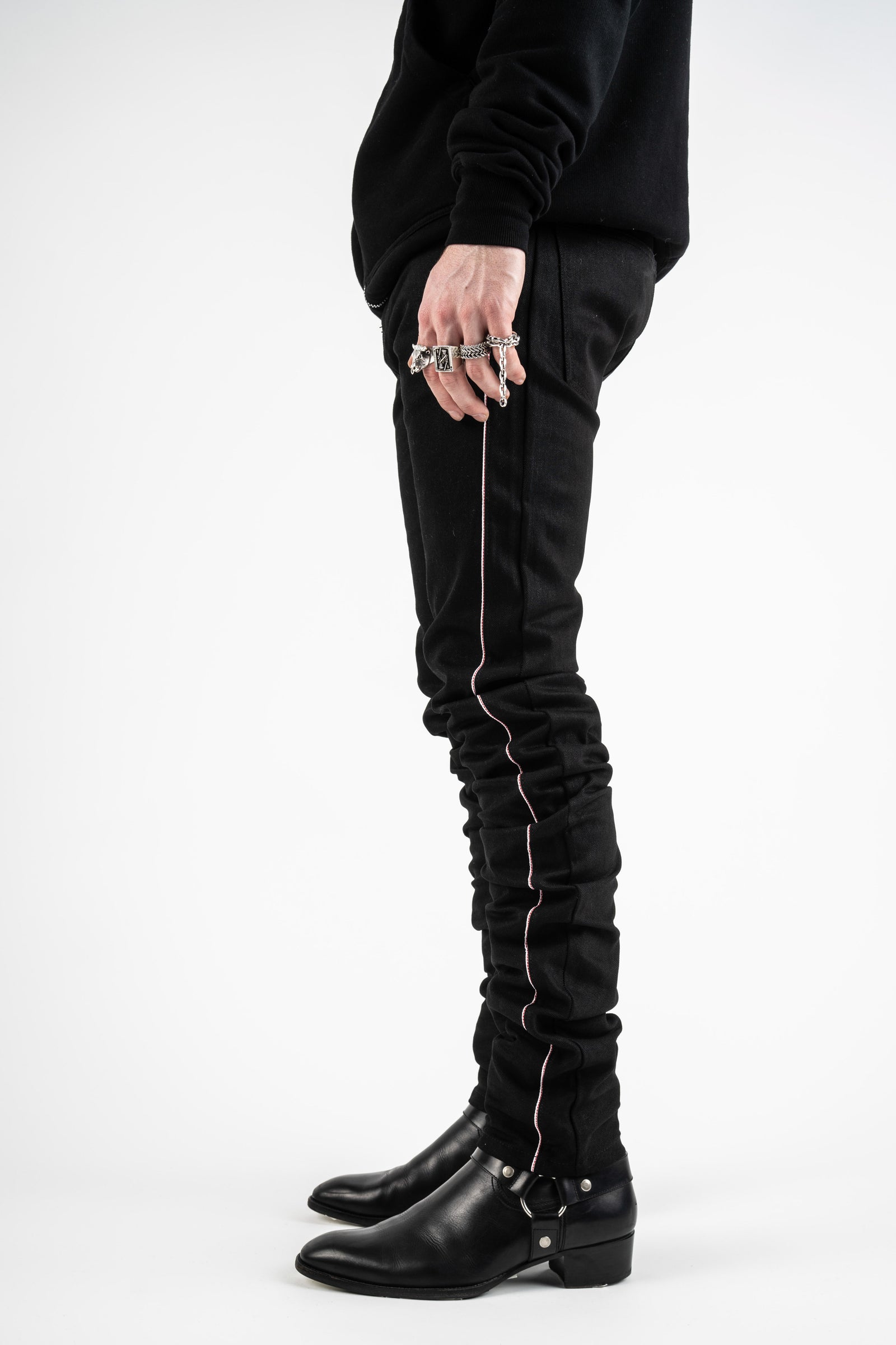 full side view of Varick jeans showing the silhouette of stacked jeans